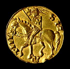 Figura 27 - Lucca, Comune. Fiorino in oro degli inizi del sec. XIV con San Martino a cavallo al rovescio. CNI XI, p. 77 n. 4