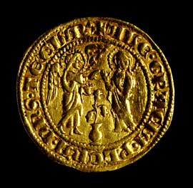 Figura 28 - Carlo I d’Angiò, re di Sicilia (1266-1285). Carlino o Saluto in oro  emesso dalla zecca di Napoli a partire dal 1278, con l’Annunciazione al rovescio. Cfr. CNI XIX, p. 13 n. 1