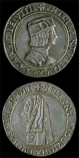 Figura 31 - Savoia. Filiberto II (1497-1504). Tallero in argento con il busto del duca con berretta al dritto e quello della  duchessa Iolanda con collare dell’Annunziata al rovescio. CNI I, p. 135 n. 1