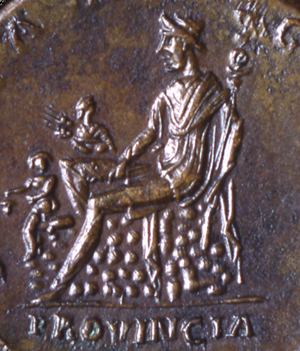 Figura 5 – Traiano (98-117 d.C.). Sesterzio emesso dalla zecca di Roma tra il 111 e il 114 con la provincia Dacia Augusta (particolare del rovescio). Roma, Museo Nazionale Romano, Medagliere
